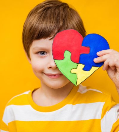 Kid,Boy,Hands,Holding,Puzzle,Heart,,Child,Mental,Health,Concept,